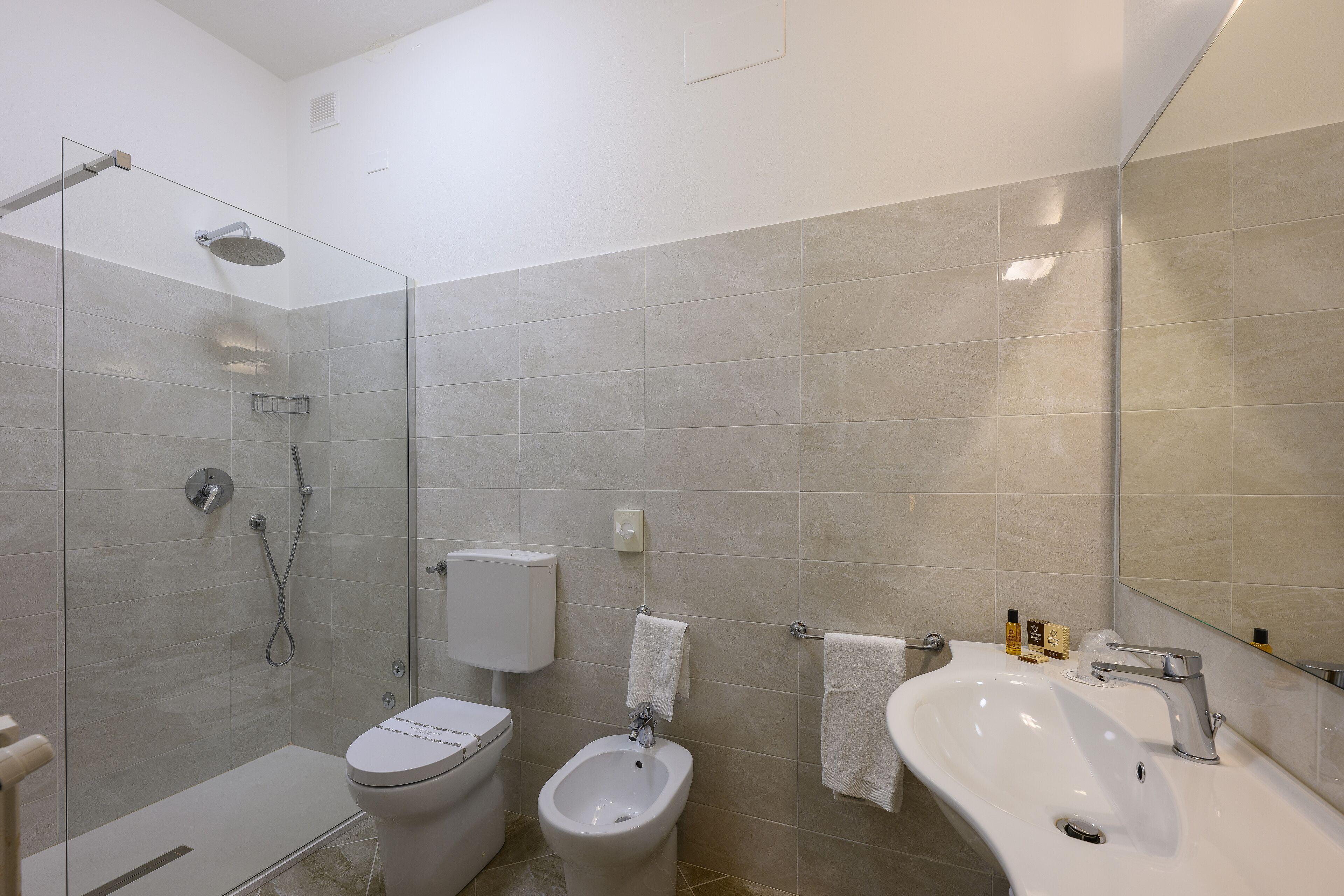 single room | bathroom | deep-soaking bathtub, rainfall showerhead, hair dryer, bidet