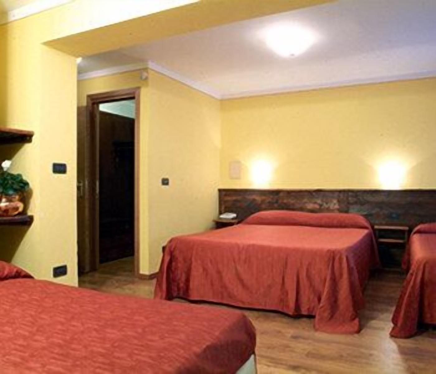 family room | in-room safe, desk, blackout curtains, iron/ironing board