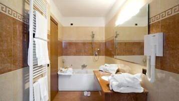 Shower, free toiletries, hair dryer, towels