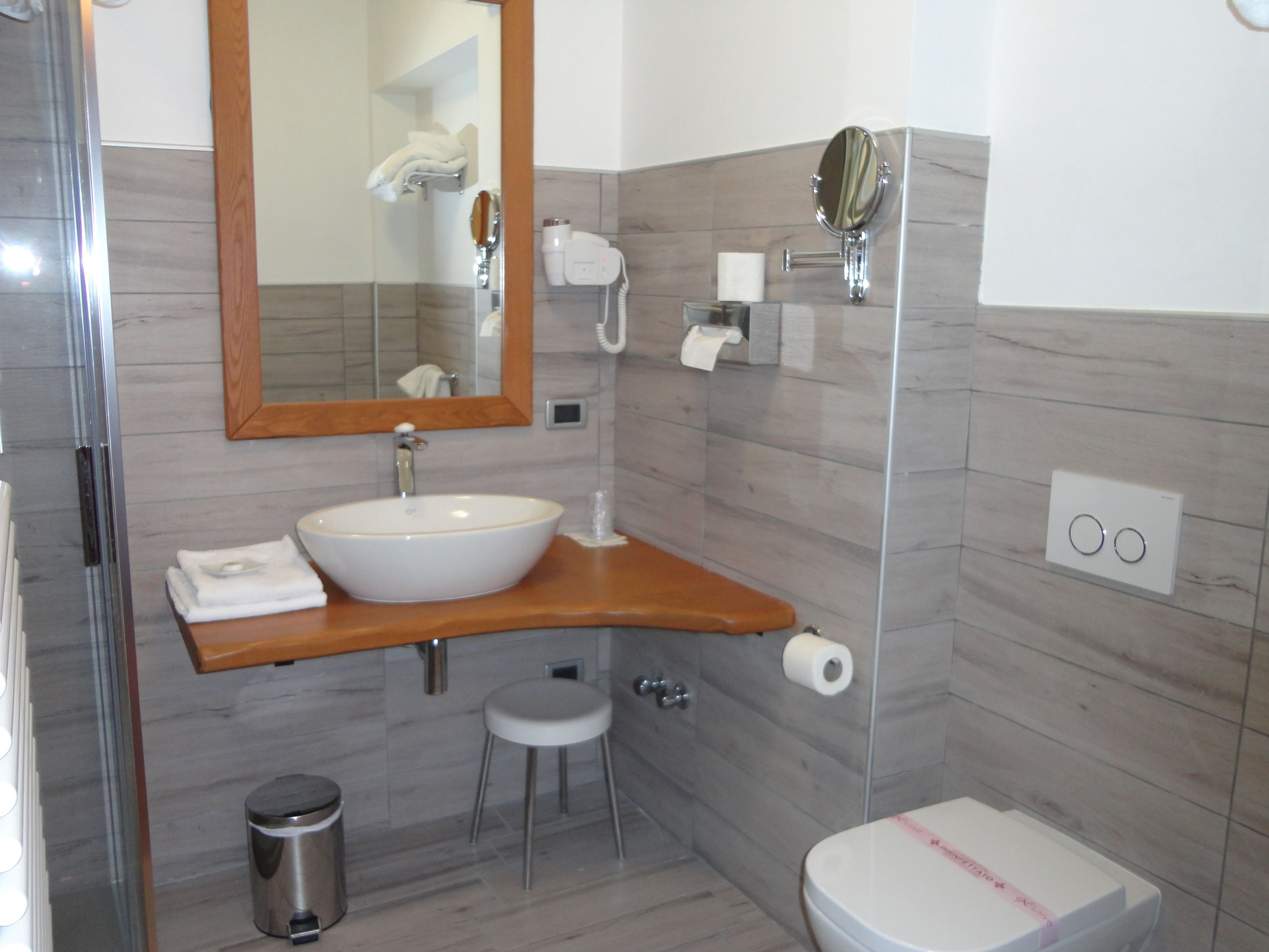 free toiletries, hair dryer, slippers, bidet