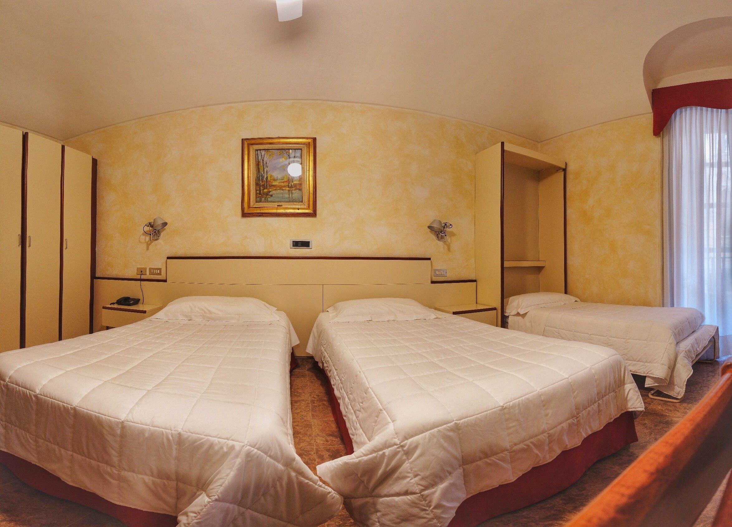 economy triple room | down duvets, minibar, individually furnished, desk