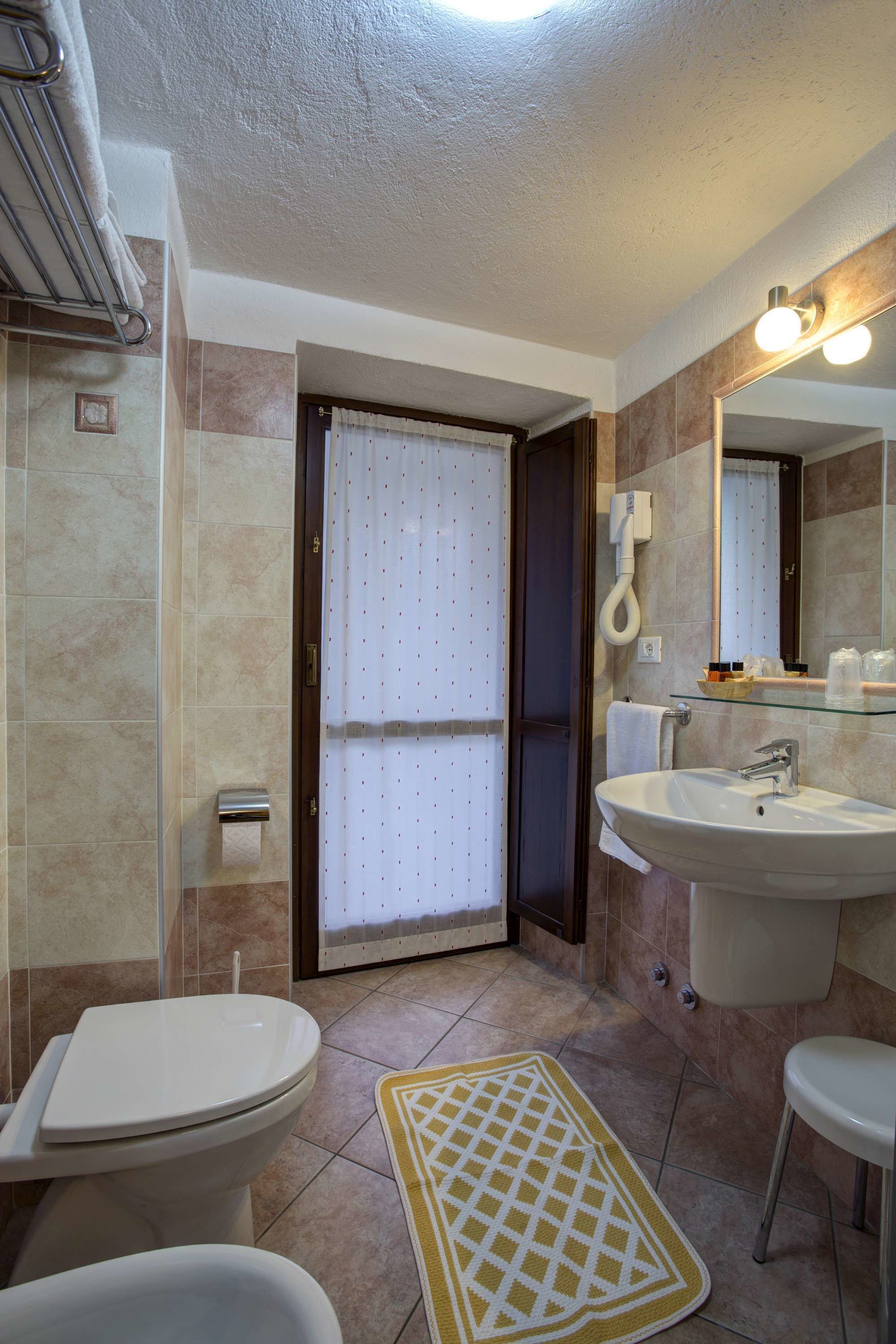 double room | bathroom | shower, rainfall showerhead, hair dryer, bidet