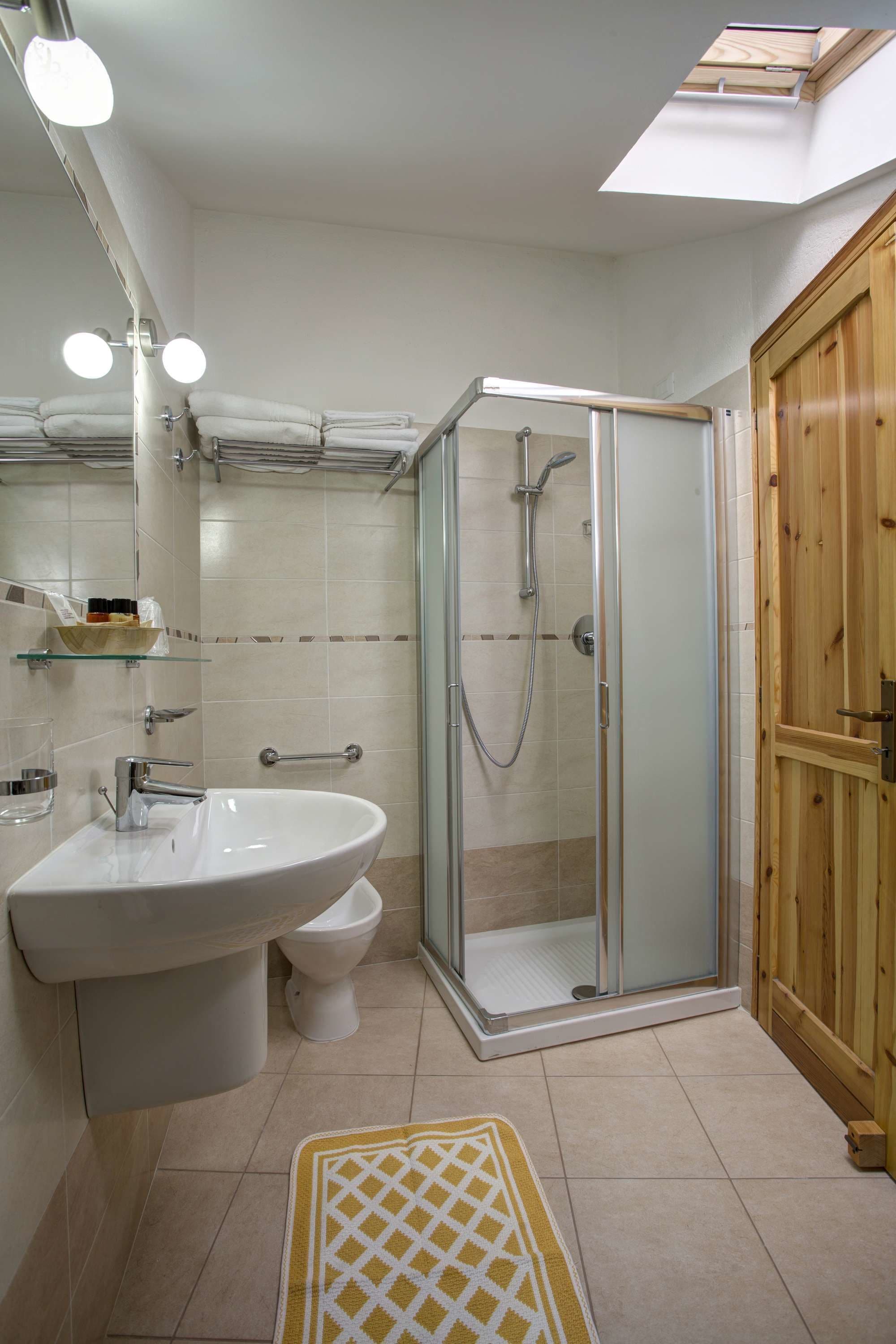 double room | bathroom | shower, rainfall showerhead, hair dryer, bidet