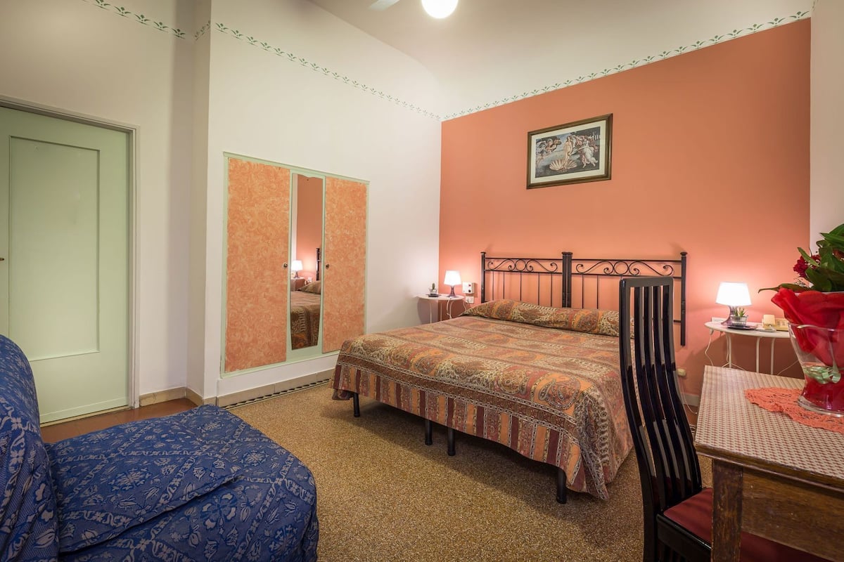 Desk, laptop workspace, free WiFi, bed sheets