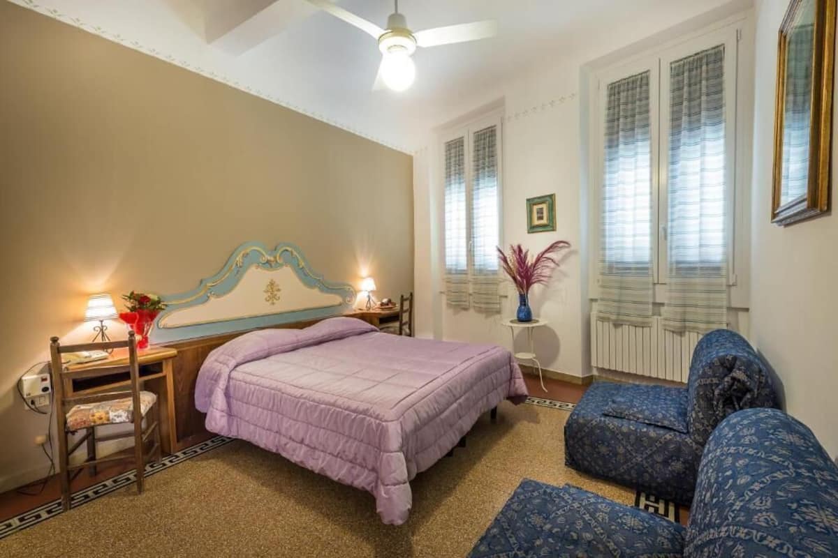 Desk, laptop workspace, free WiFi, bed sheets