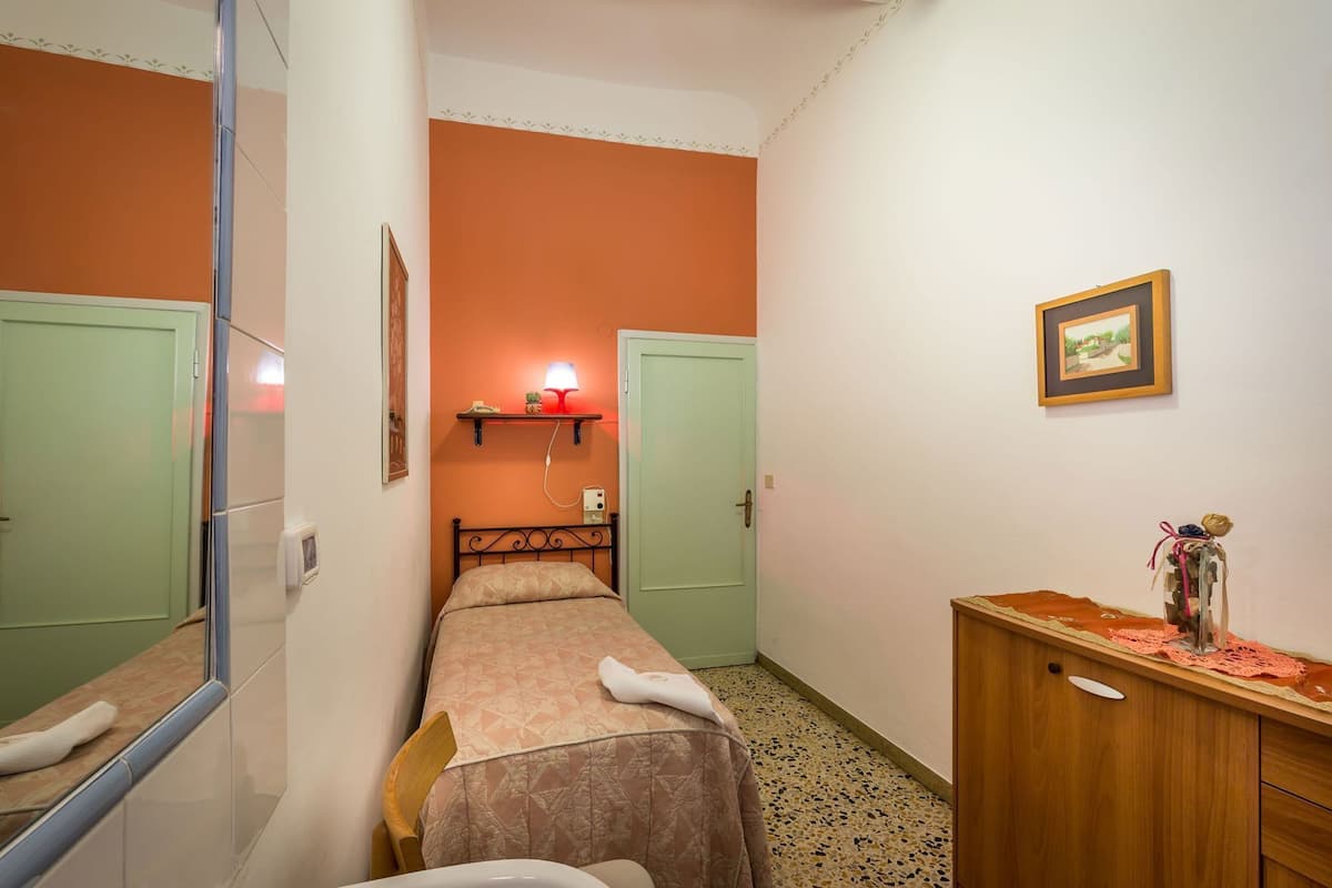 Desk, laptop workspace, free WiFi, bed sheets