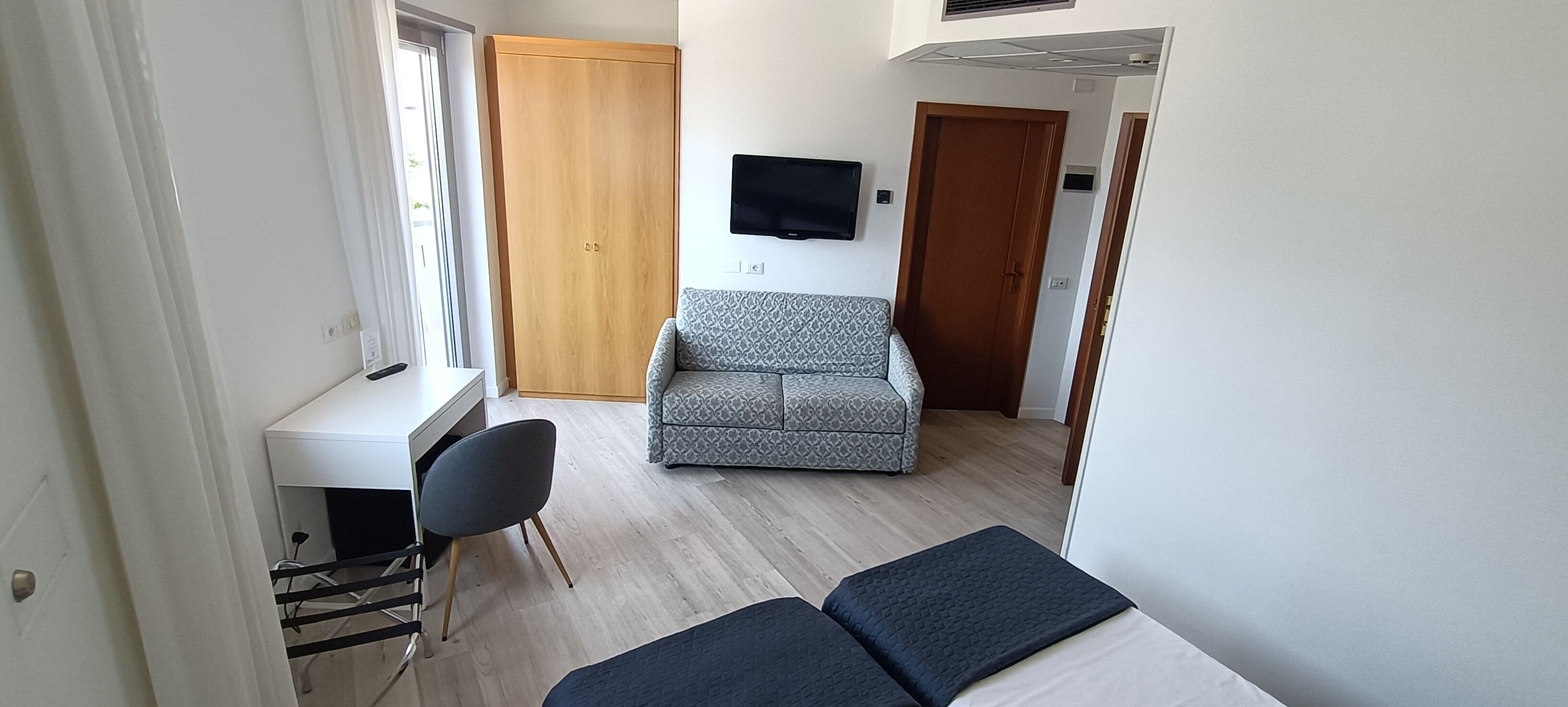 family room, 2 bedrooms | minibar, in-room safe, desk, free wifi
