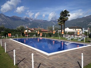 Outdoor pool, open 9:00 AM to 7:00 PM, sun loungers