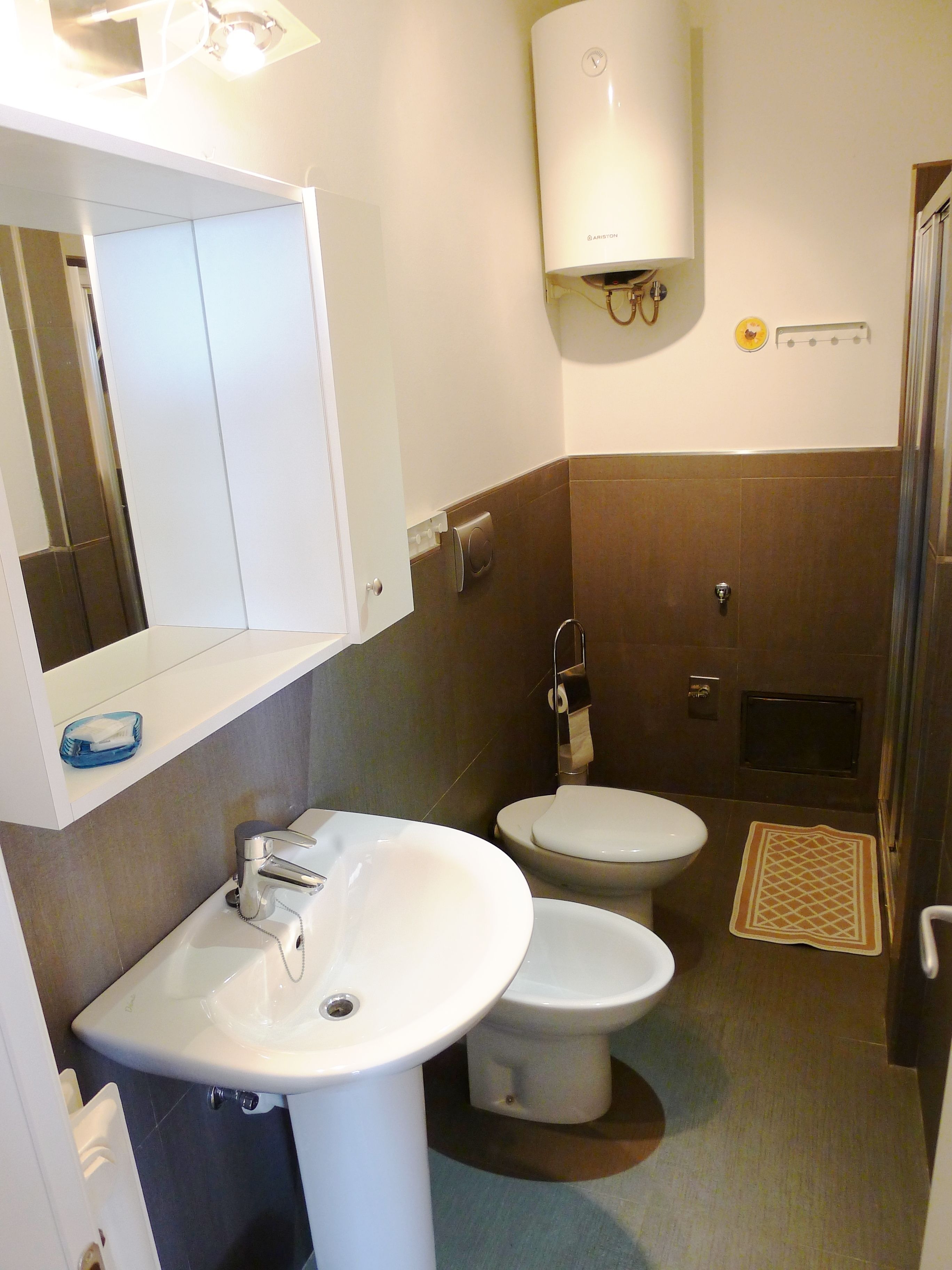 free toiletries, hair dryer, slippers, bidet