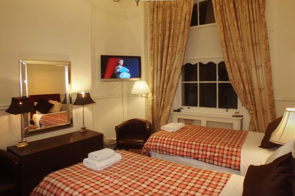 Standaard Twin kamer | Een strijkplank/strijkijzer, gratis wifi, beddengoed