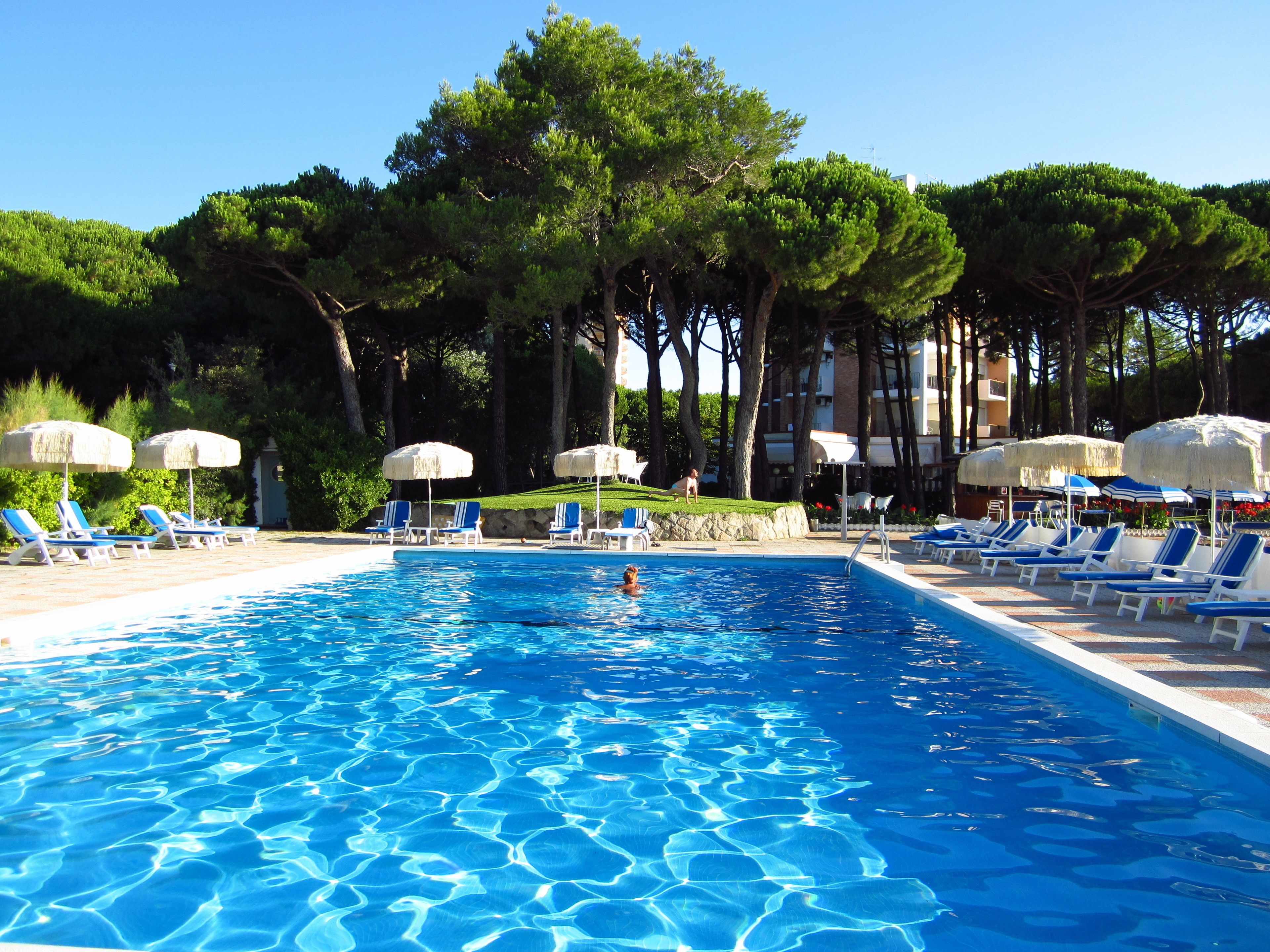 outdoor pool, pool umbrellas, pool loungers