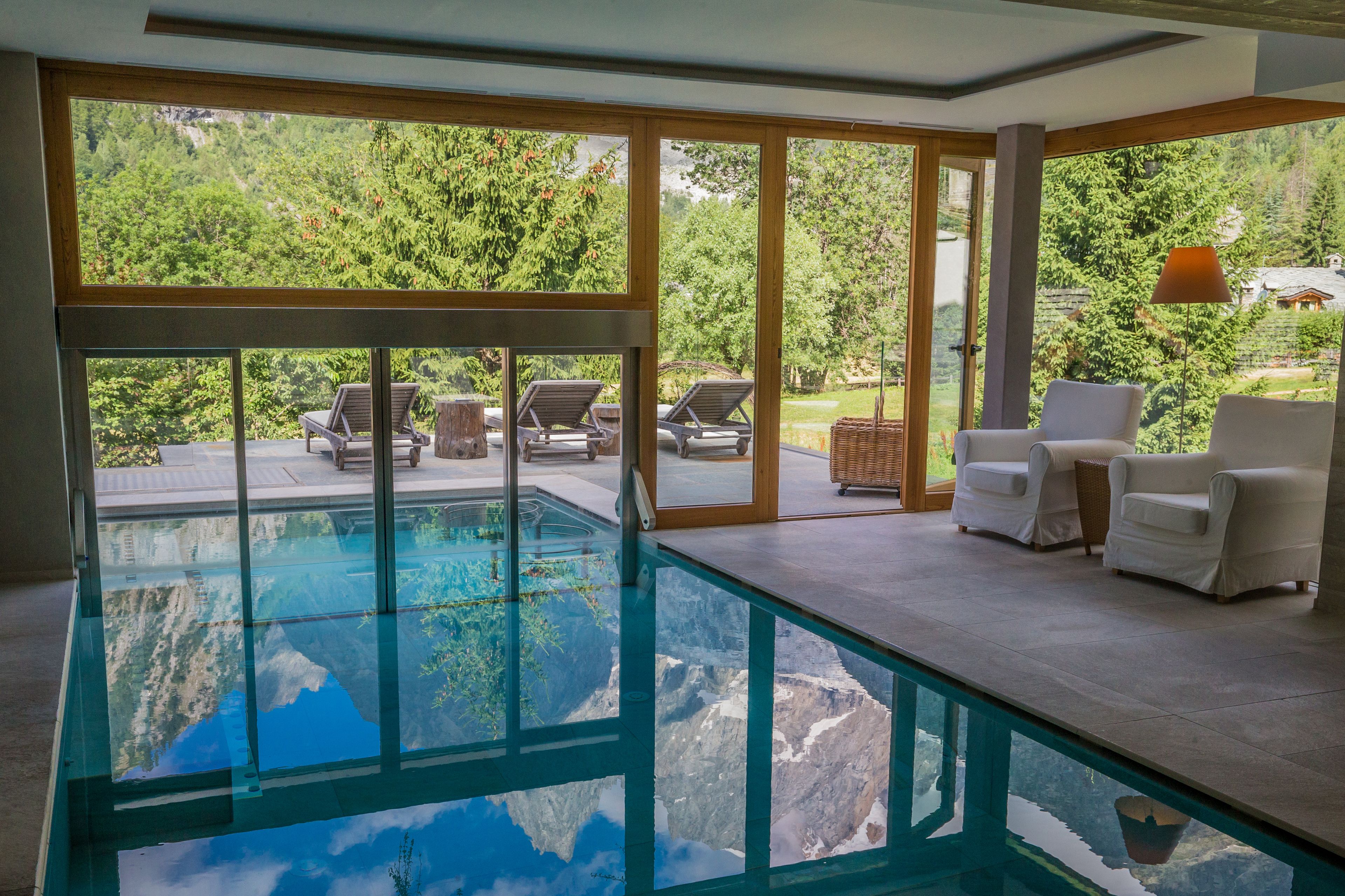 indoor pool, outdoor pool, pool loungers