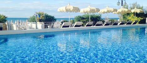 Outdoor pool, cabanas (surcharge), sun loungers