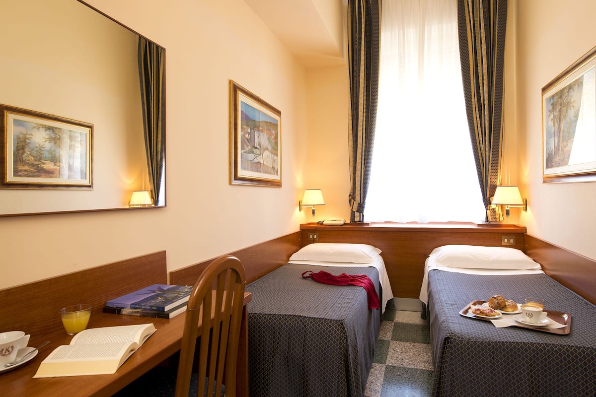 Desk, blackout curtains, free WiFi, bed sheets