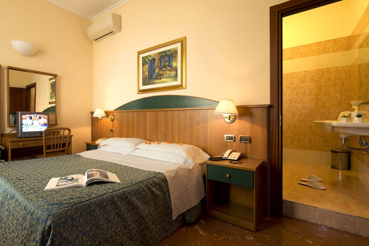 Desk, blackout curtains, free WiFi, bed sheets
