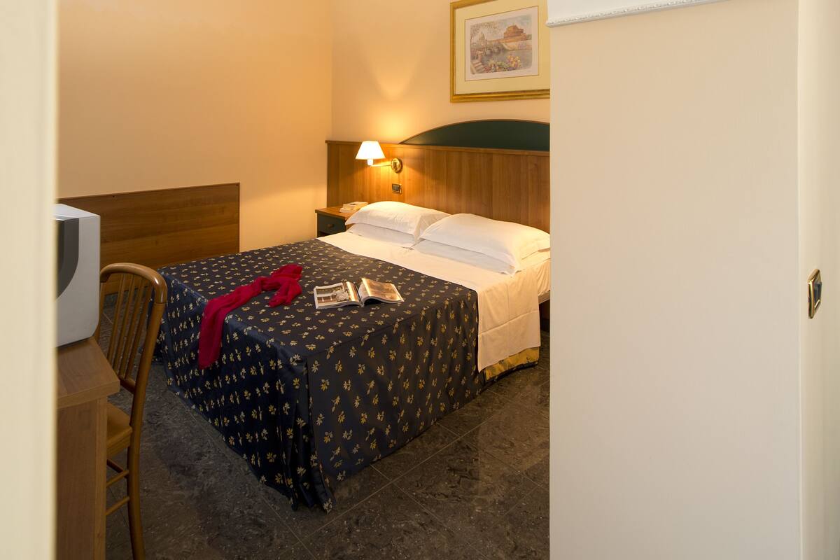 Desk, blackout curtains, free WiFi, bed sheets