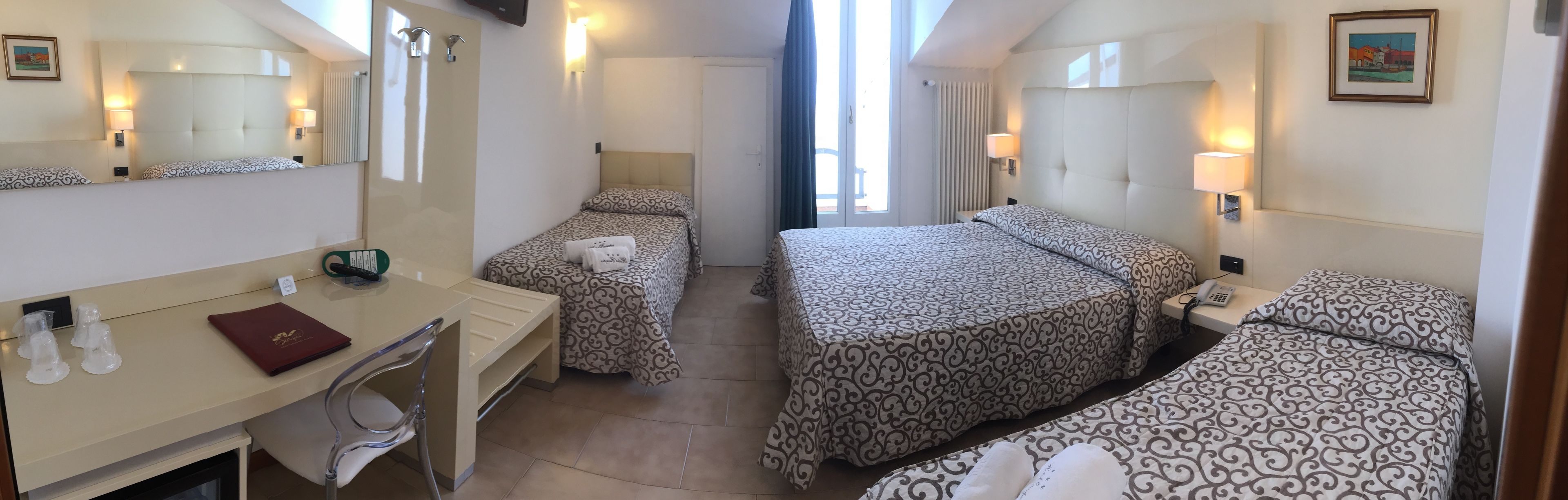 quadruple room | frette italian sheets, premium bedding, down duvets, memory-foam beds