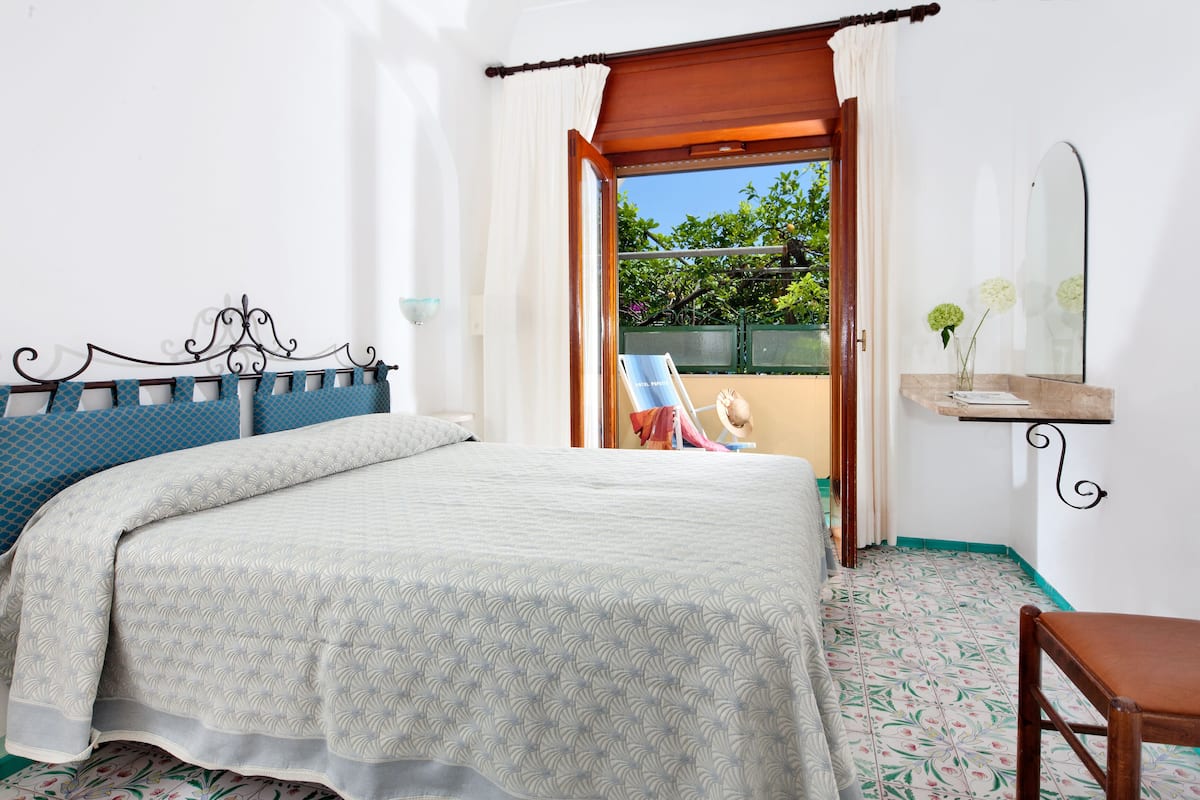 Standard Double Room, Balcony, Garden View | 1 bedroom, down comforters, minibar, in-room safe