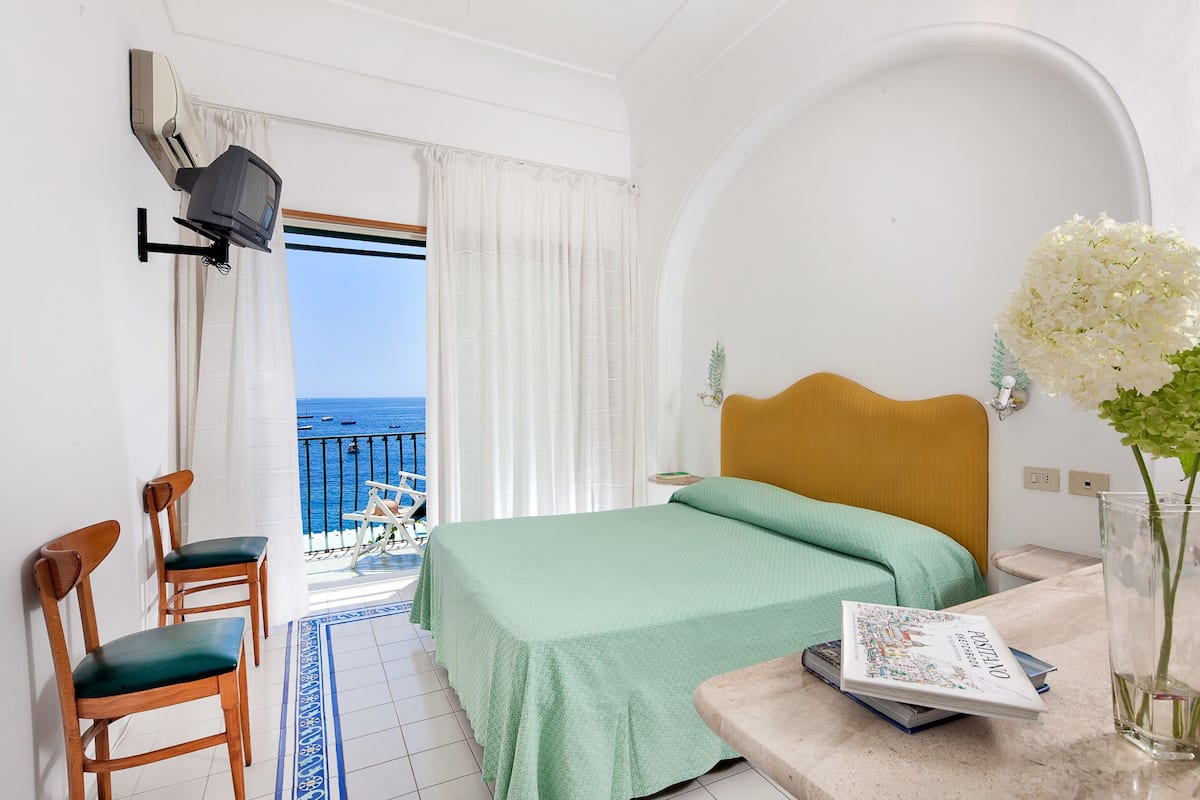 Standard Double Room, Balcony, Sea View | 1 bedroom, down comforters, minibar, in-room safe