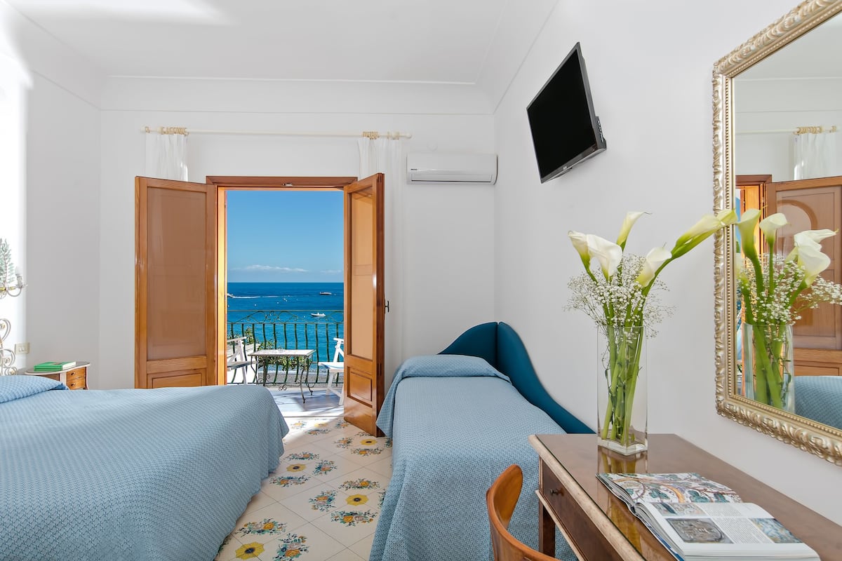 Triple Room, Balcony, Sea View | 1 bedroom, down comforters, minibar, in-room safe