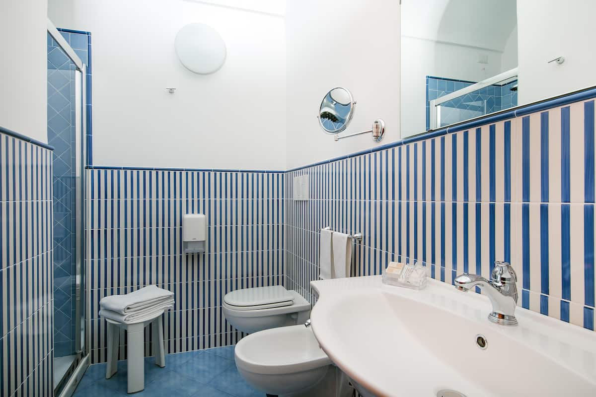 comfort triple room, terrace, sea view | bathroom | rainfall showerhead, hair dryer, bidet, towels