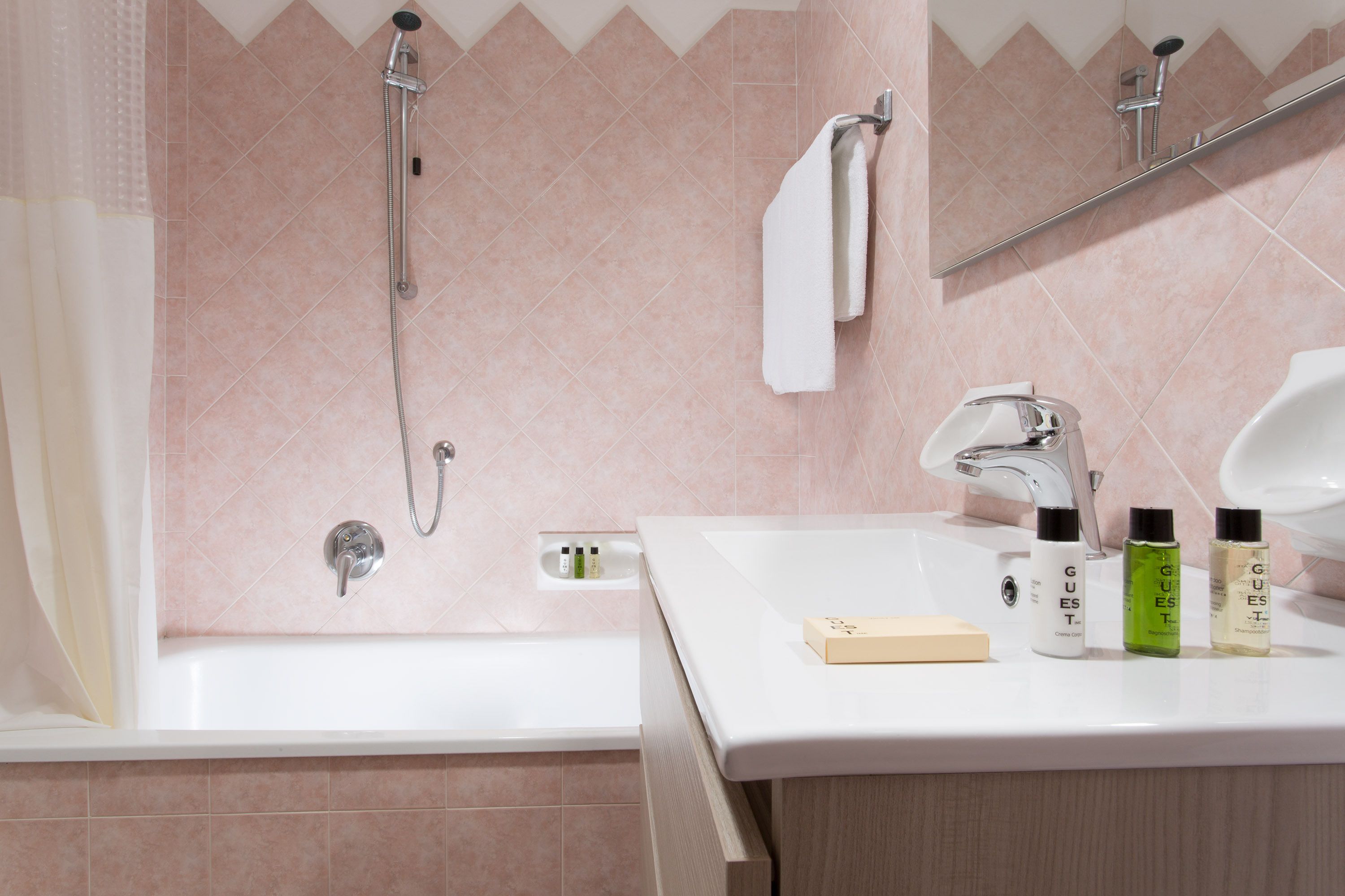 free toiletries, hair dryer, slippers, towels