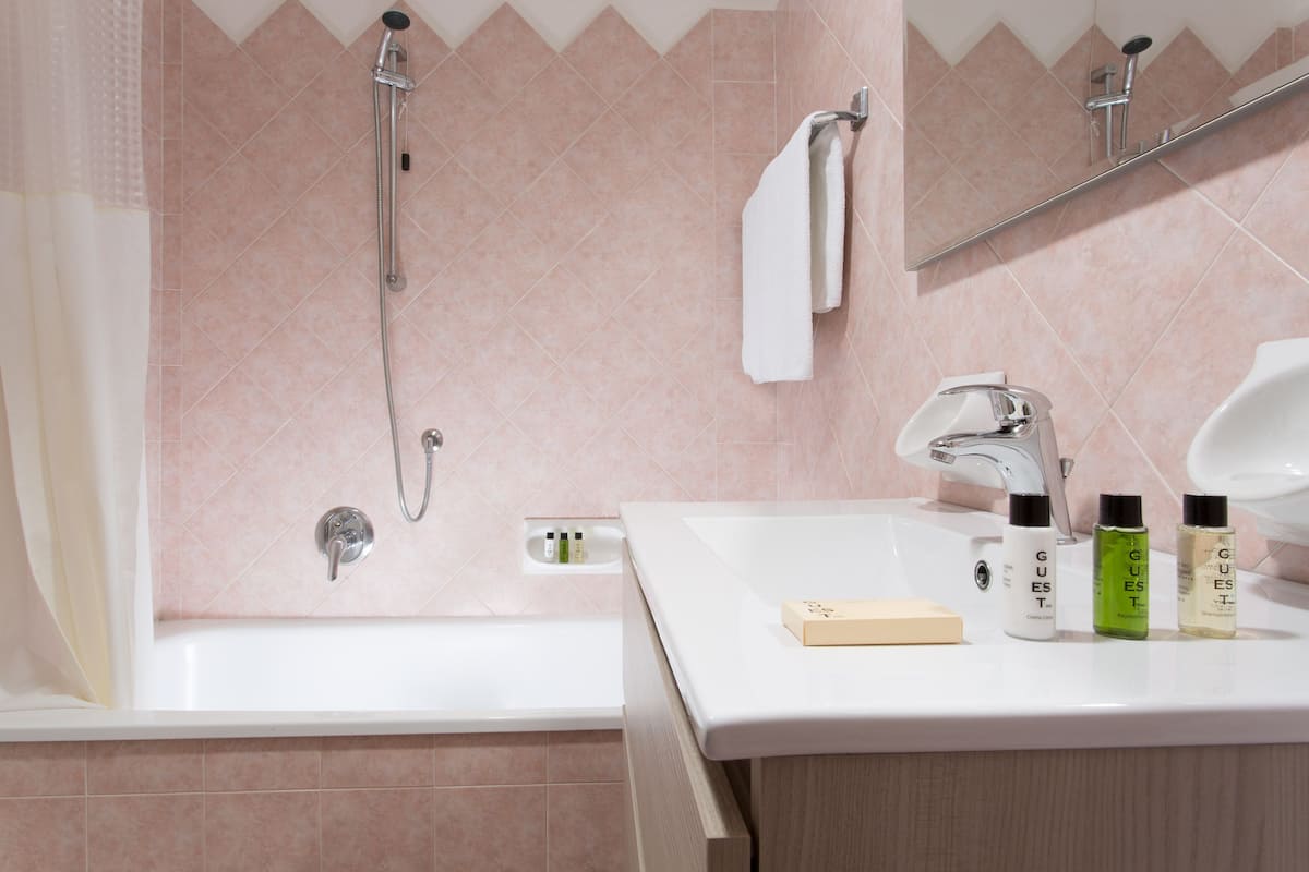 free toiletries, hair dryer, slippers, towels