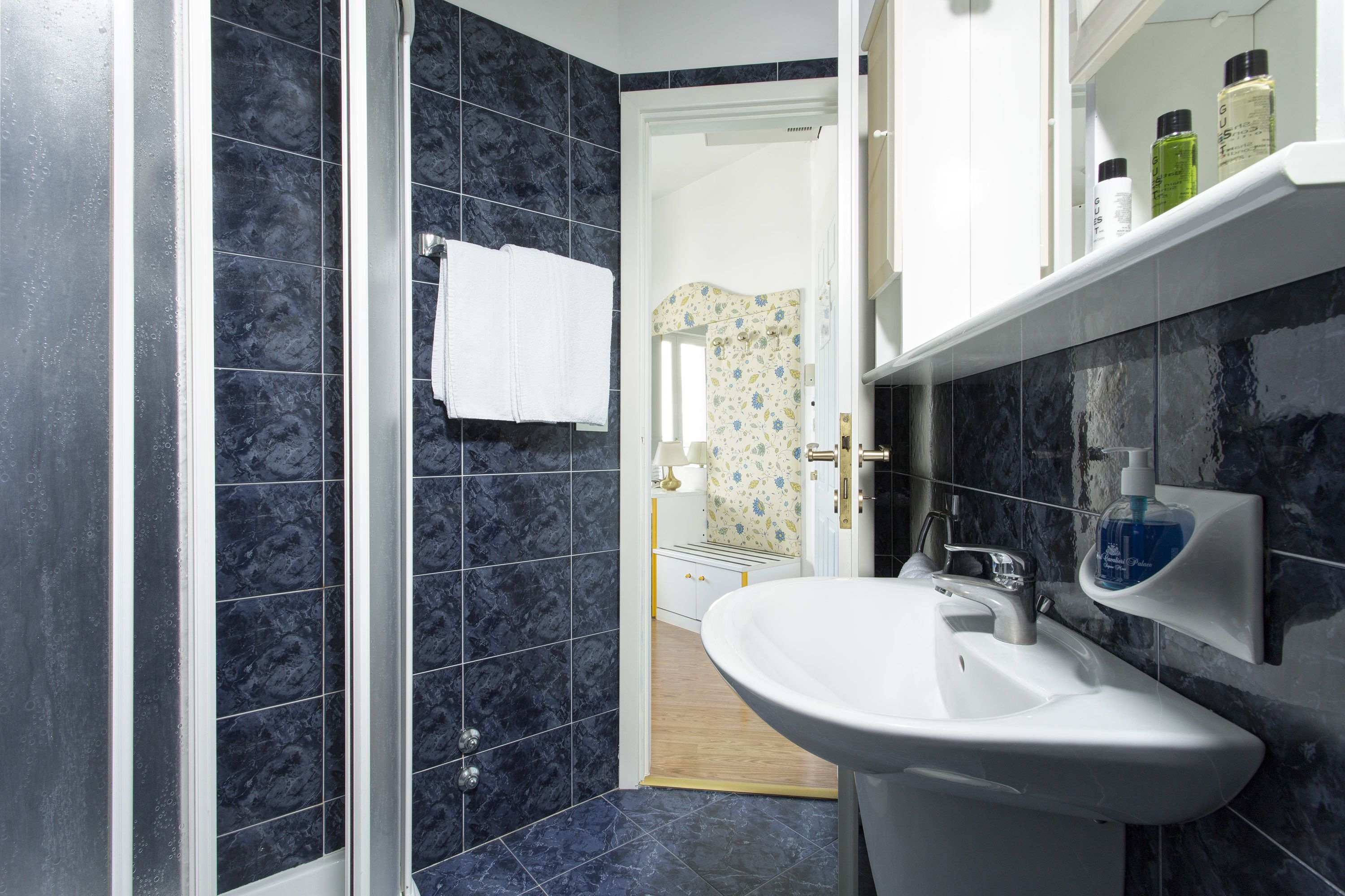 free toiletries, hair dryer, slippers, towels