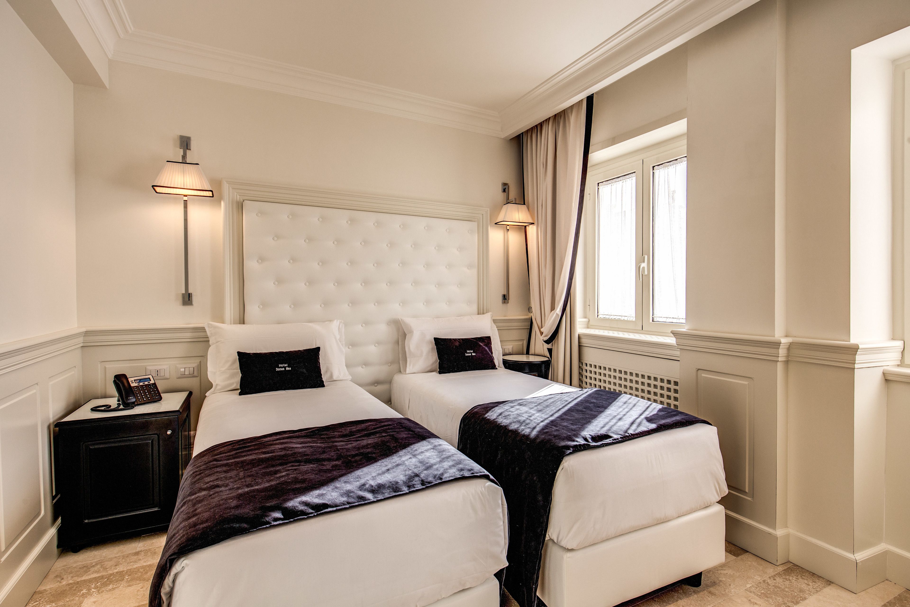 twin room | minibar, in-room safe, desk, blackout curtains