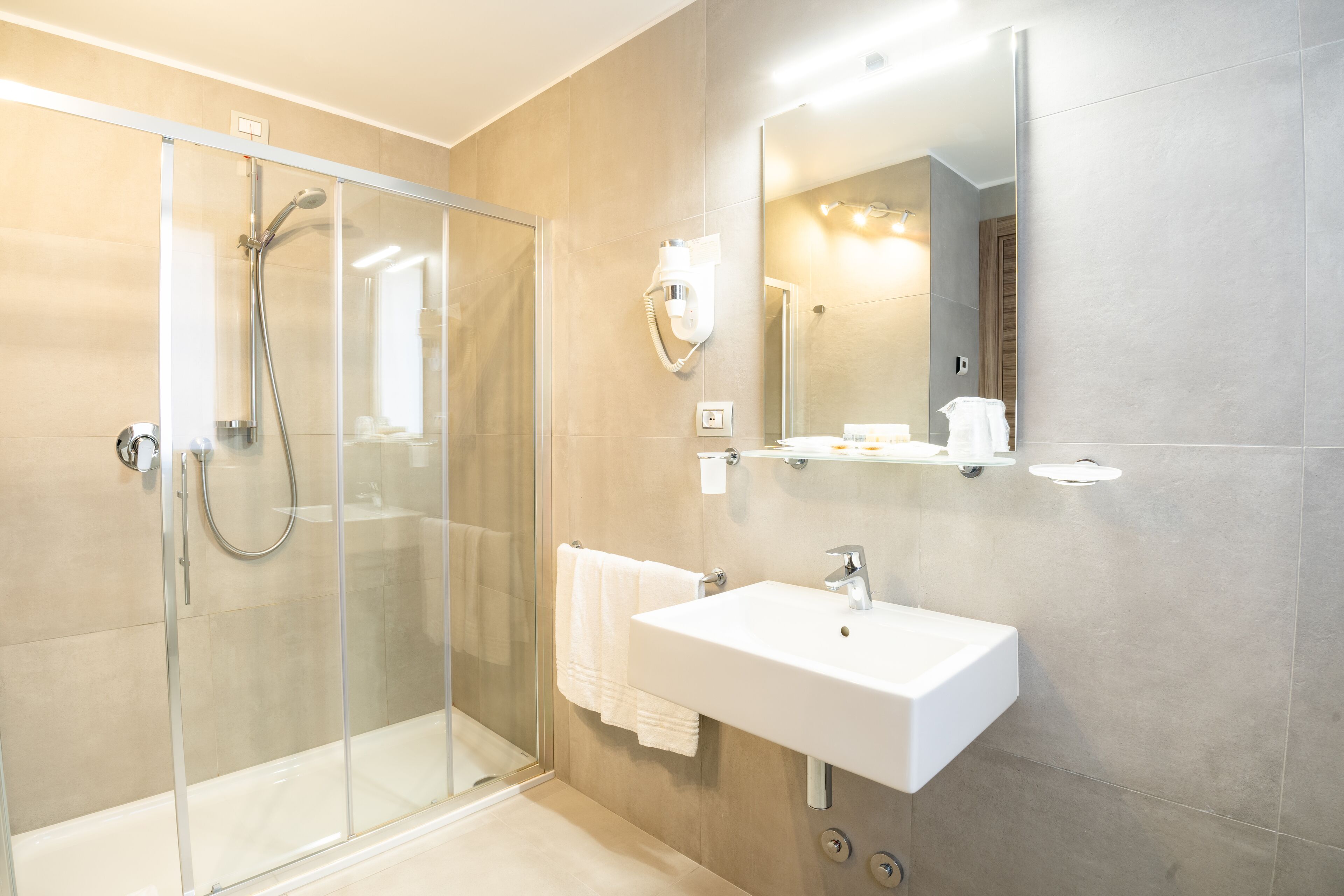 shower, rainfall showerhead, eco-friendly toiletries, hair dryer