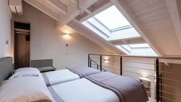 Camera familiare su 2 livelli | Ropa de cama de alta calidad, edredón y minibar