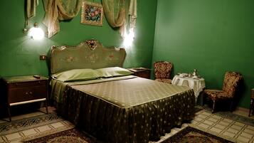 Premium bedding, down comforters, in-room safe, individually decorated