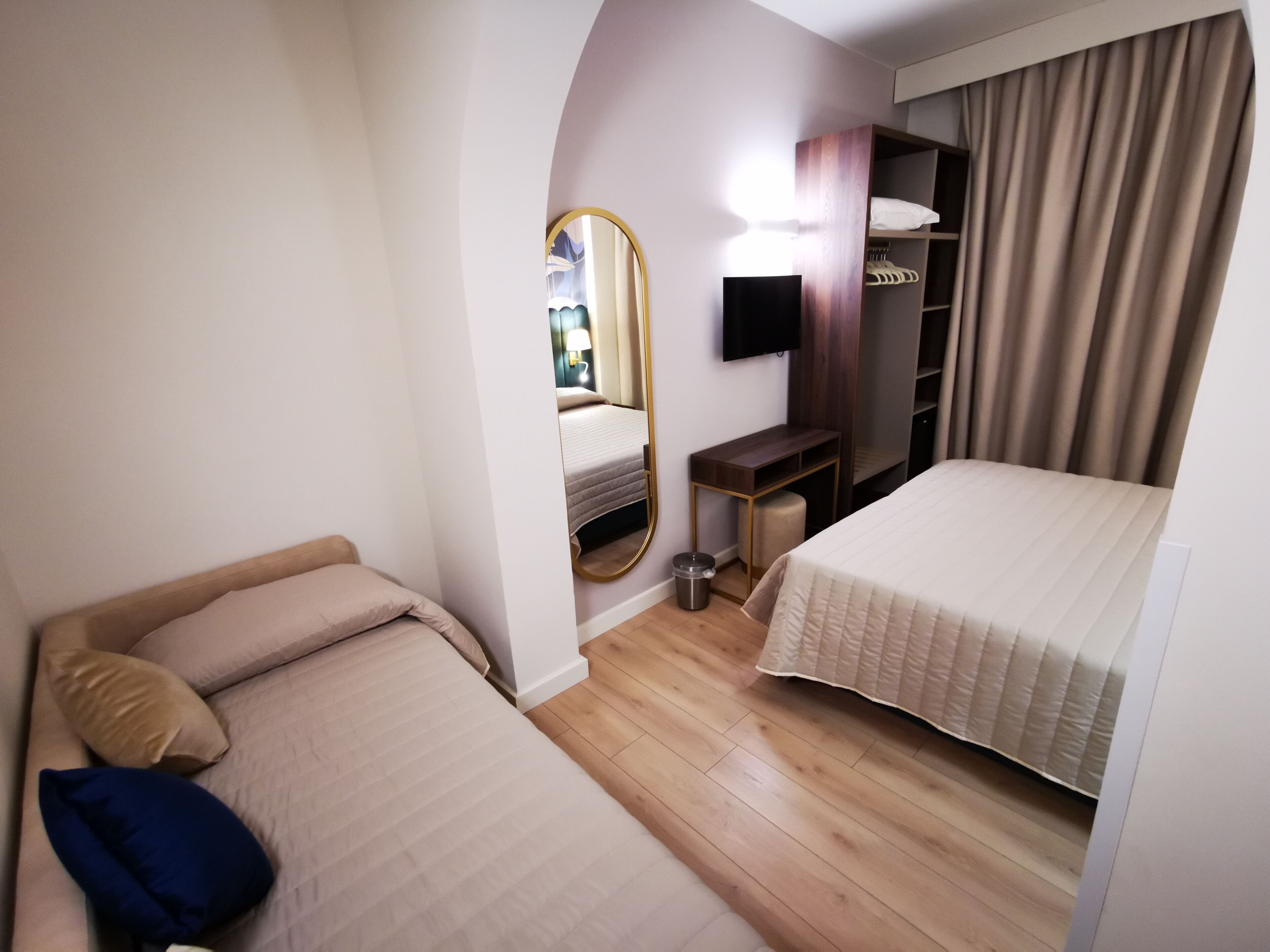 triple room, ensuite | minibar, in-room safe, desk, blackout curtains