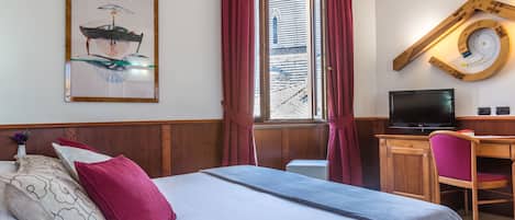 Junior Quadruple Room | 1 bedroom, minibar, in-room safe, blackout curtains