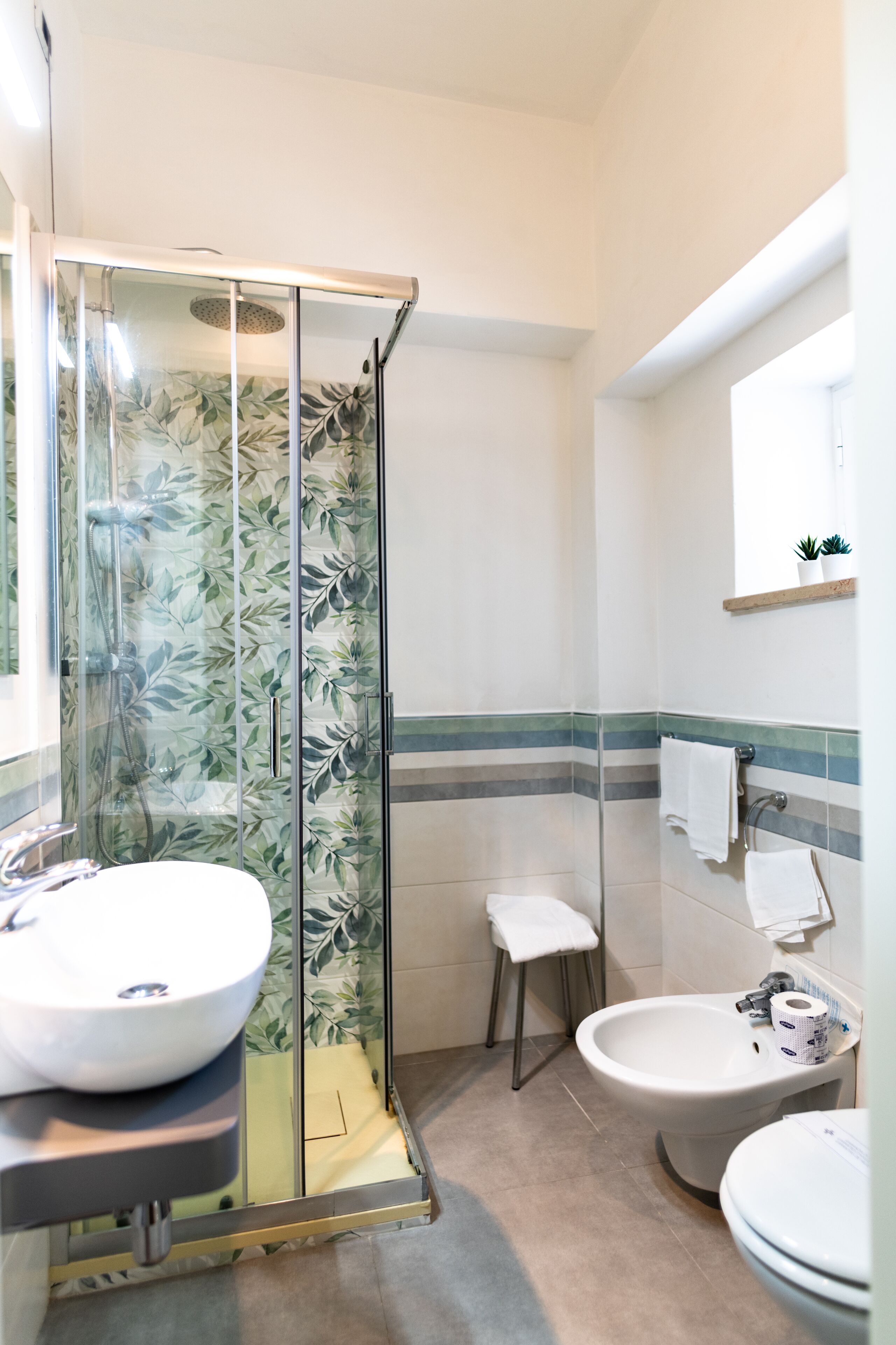 free toiletries, hair dryer, slippers, bidet