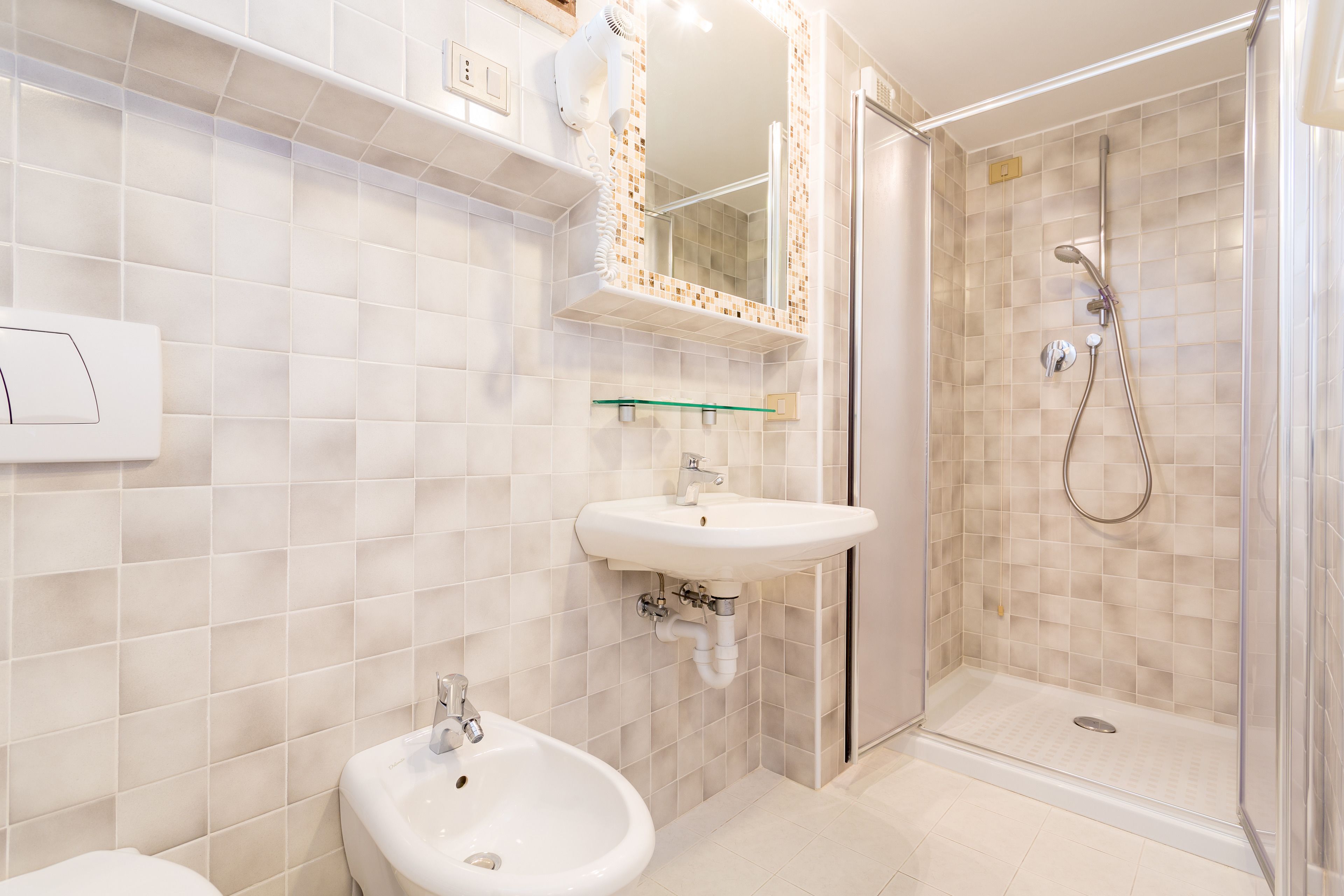 standard double room | bathroom | shower, free toiletries, hair dryer, bathrobes