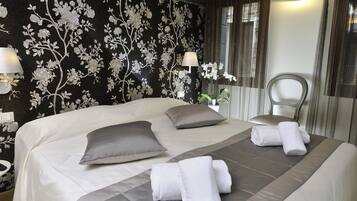 Premium bedding, down duvets, in-room safe, cots/infant beds