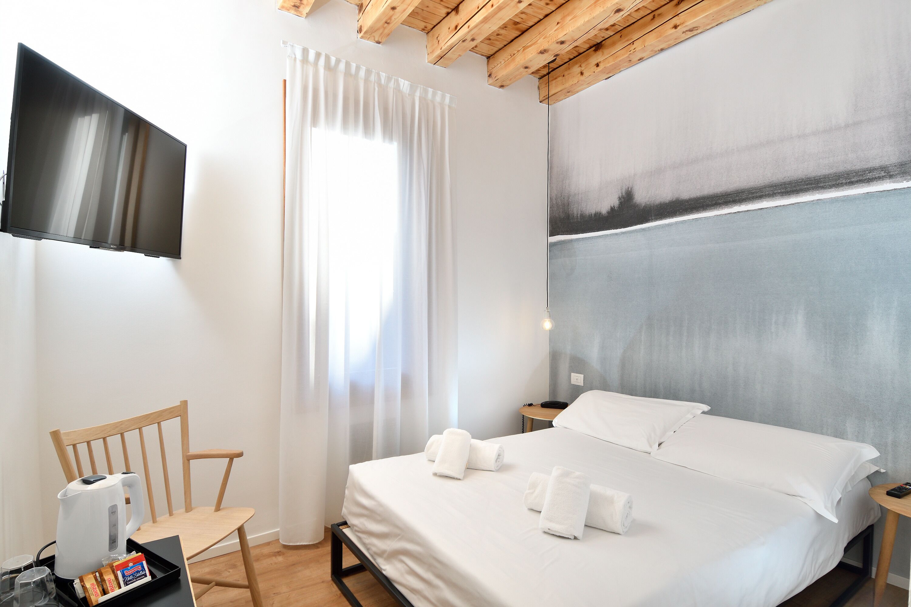 economy double room | premium bedding, down duvets, in-room safe, cots/infant beds