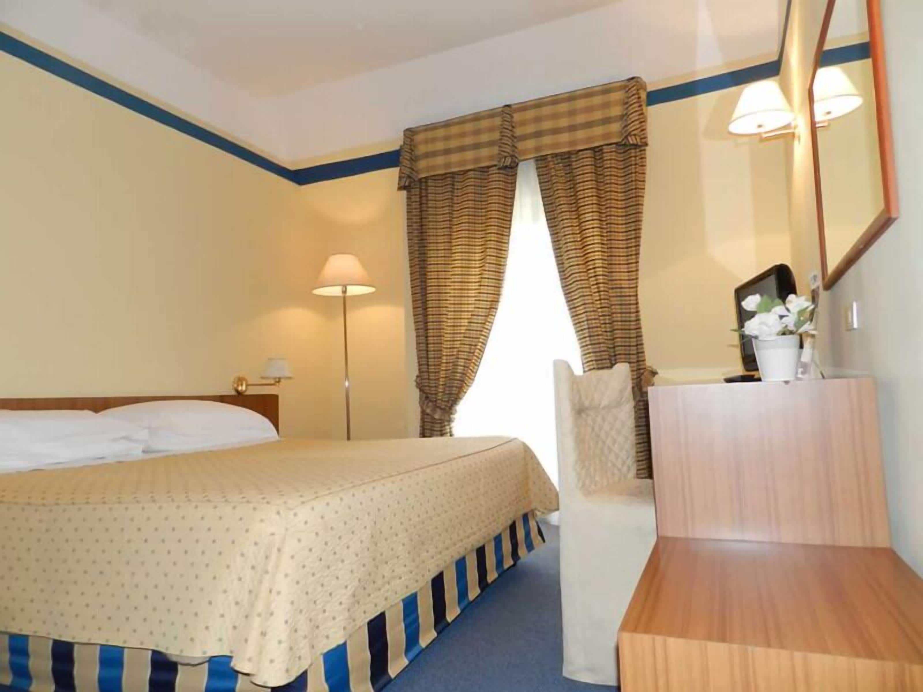 2 bedrooms, premium bedding, down duvets, minibar