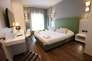 Premium bedding, down duvets, minibar, desk