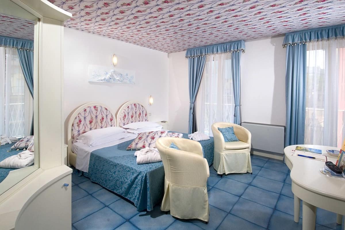 Family Quadruple Room, 1 Bedroom, Garden View, Garden Area | Minibar, in-room safe, desk, blackout drapes