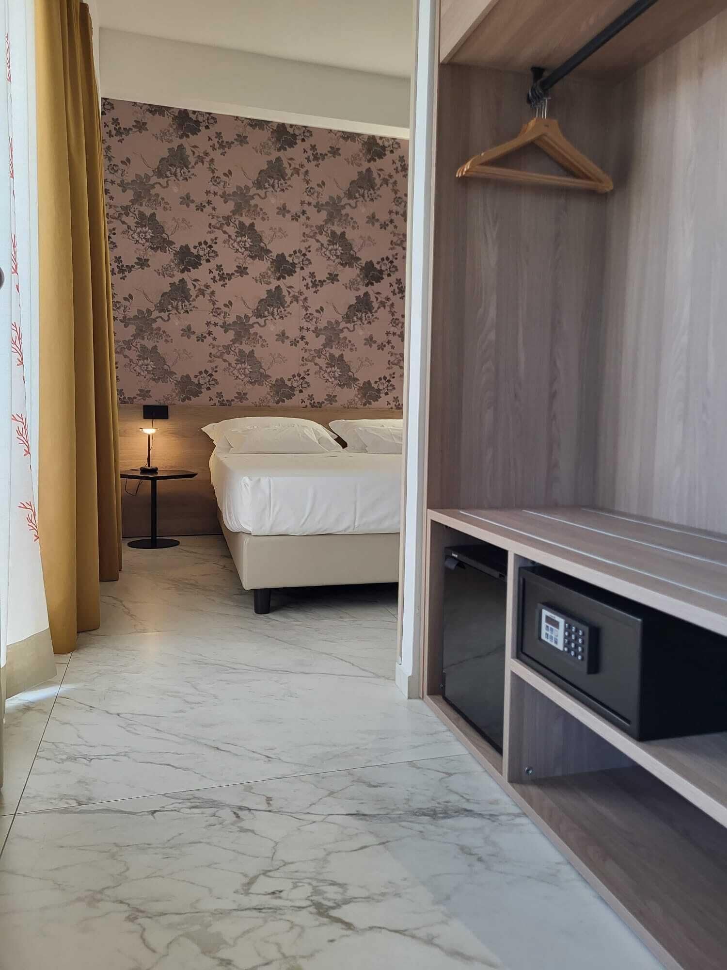 superior triple room | minibar, in-room safe, desk, soundproofing