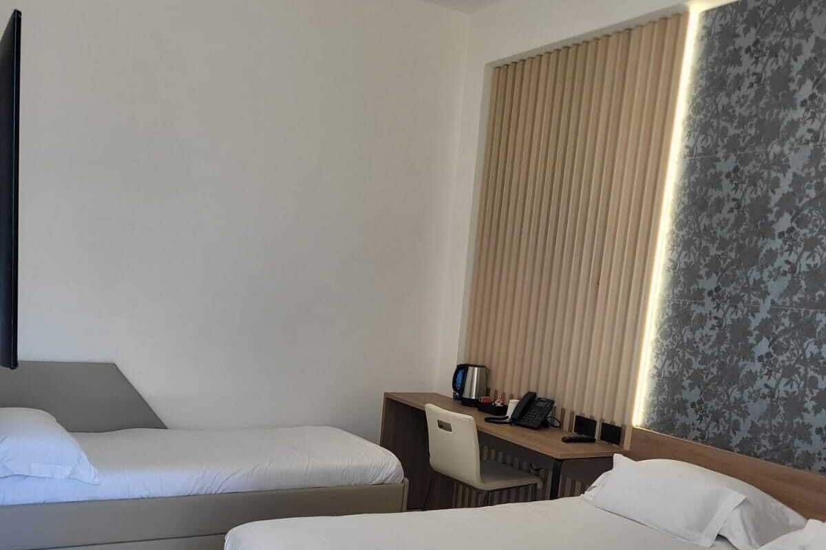 Superior Triple Room | Minibar, in-room safe, desk, soundproofing
