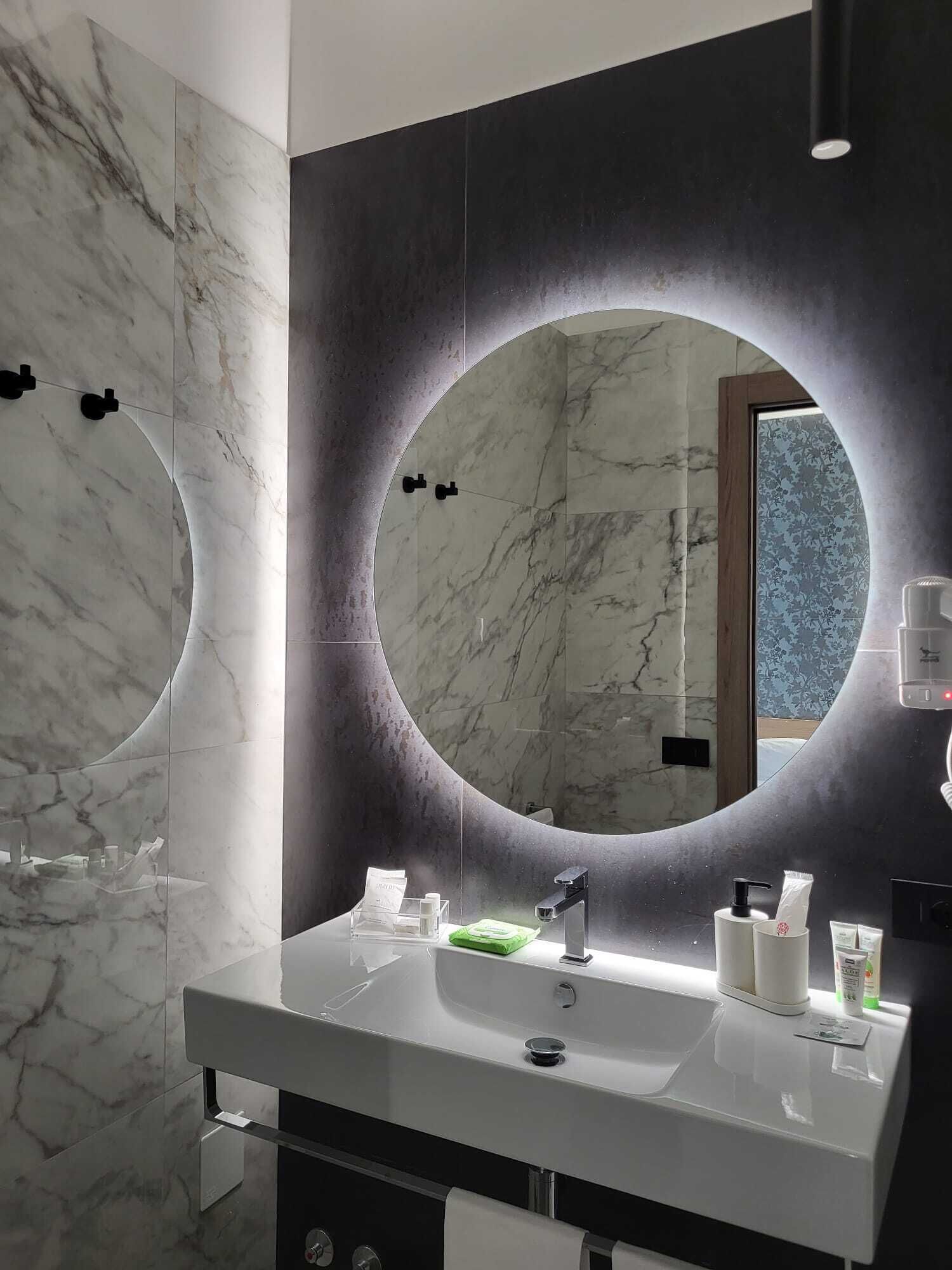 shower, hair dryer, bathrobes, slippers