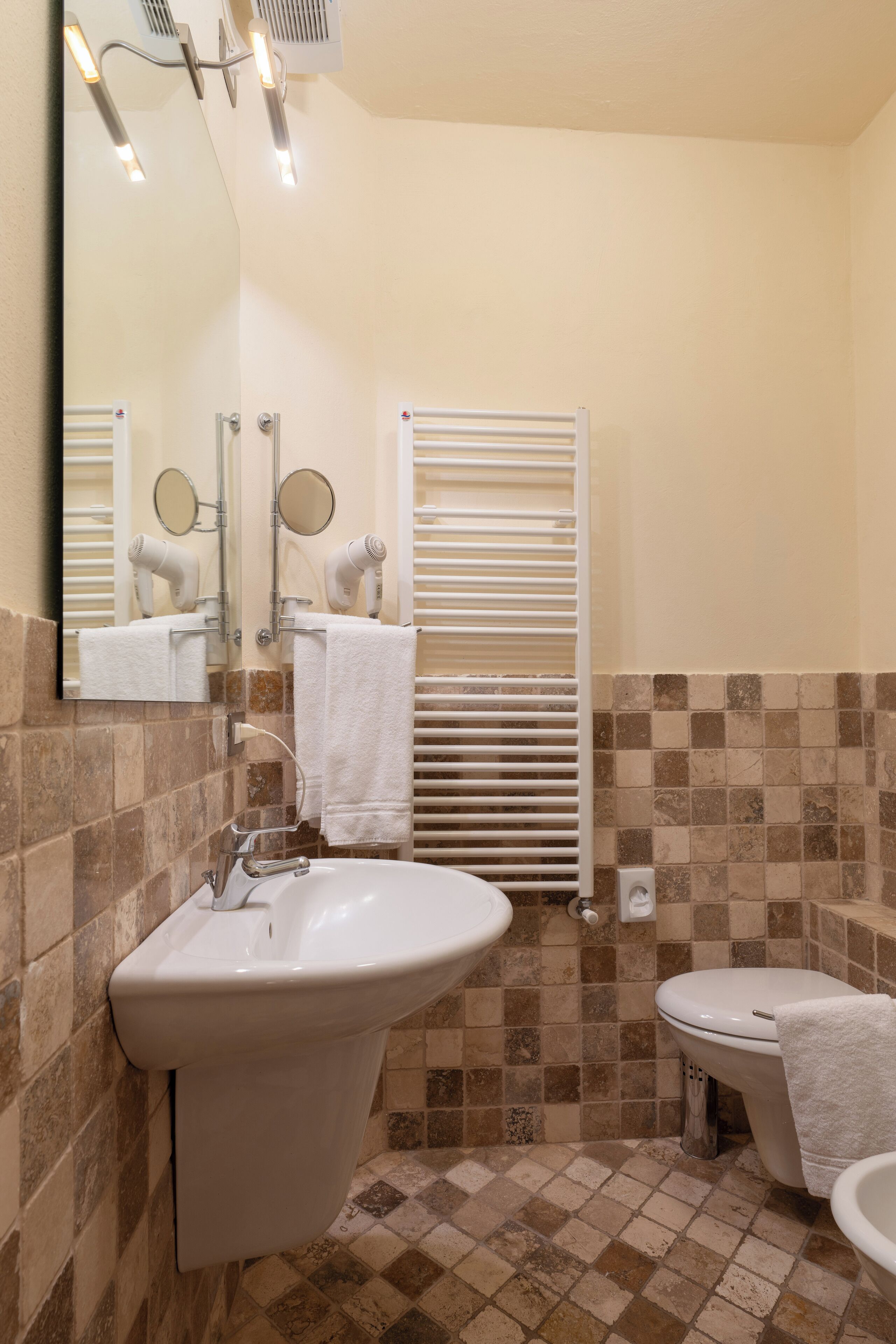 superior double room | bathroom | shower, hair dryer, bidet, towels