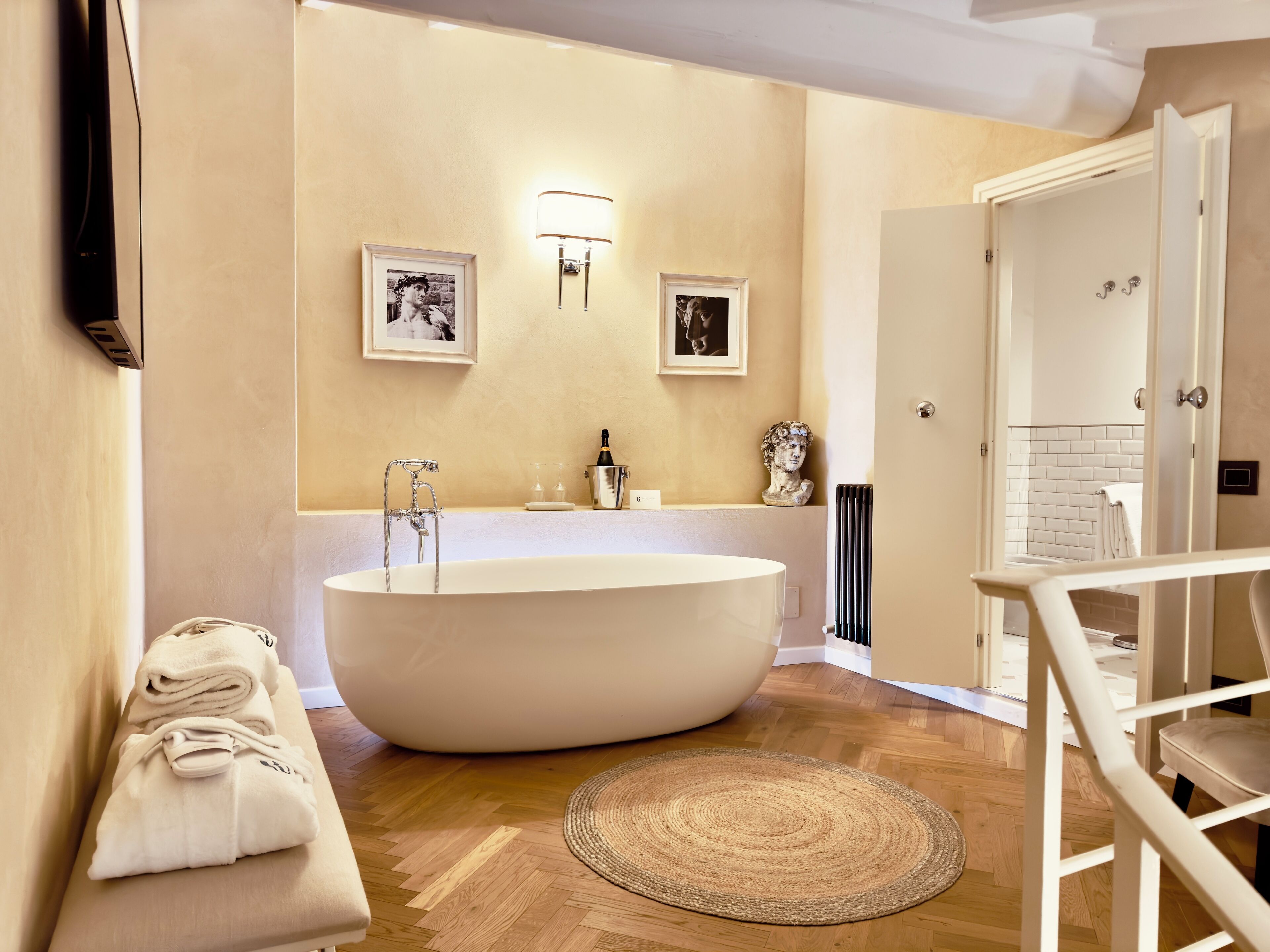 junior studio suite | bathroom | free toiletries, hair dryer, bathrobes, slippers