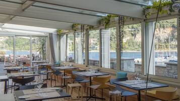 Breakfast, lunch, dinner served; Mediterranean cuisine, sea views