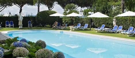 Seasonal outdoor pool, pool umbrellas, sun loungers