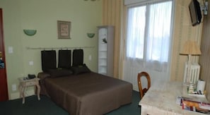 Premium bedding, desk, blackout curtains, iron/ironing board