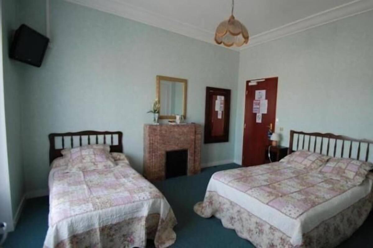Triple Room | Premium bedding, desk, blackout drapes, iron/ironing board (on request)